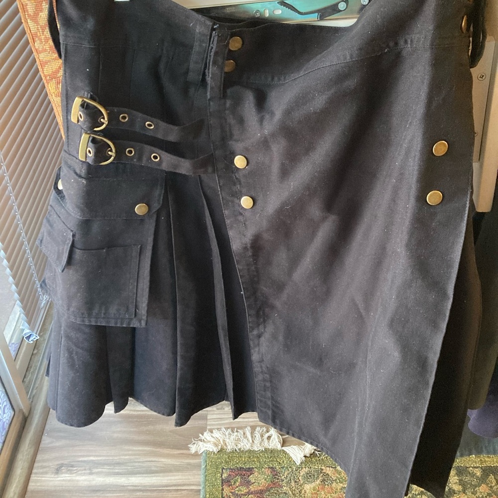 Stylish Black Skirt with Buckle Details